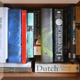 B13. Hardcover books. - $2; Paperback books. - $1